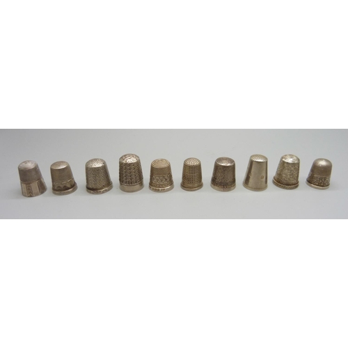 1044 - Ten silver thimbles