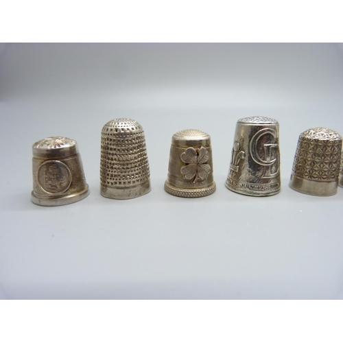 1045 - Ten silver thimbles