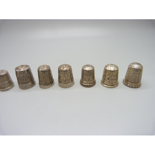 1047 - Ten silver thimbles