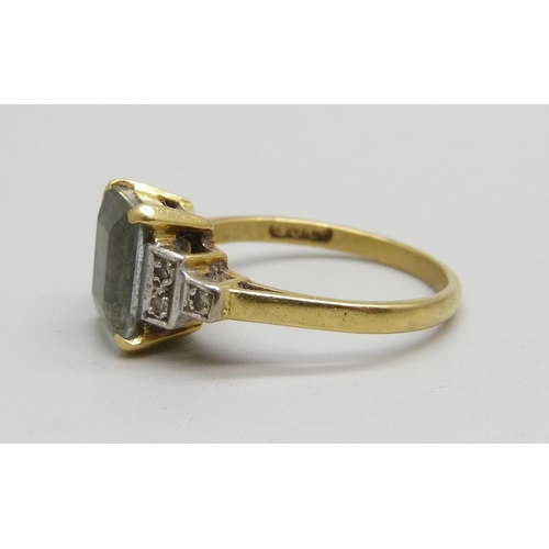 1055 - A 9ct gold, blue and white stone ring, 4.2g, N