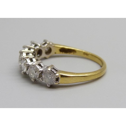 1060 - An 18ct gold and diamond ring, 3.2g, O, 1ct diamond weight, (marked on the shank)