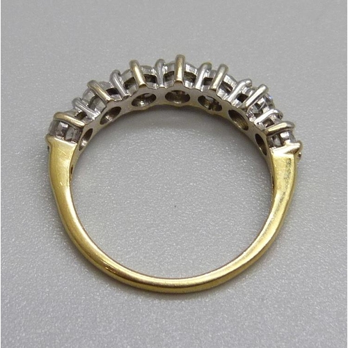 1060 - An 18ct gold and diamond ring, 3.2g, O, 1ct diamond weight, (marked on the shank)