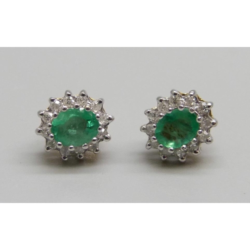 1062 - A pair of yellow metal, emerald and diamond earrings, 1.7g