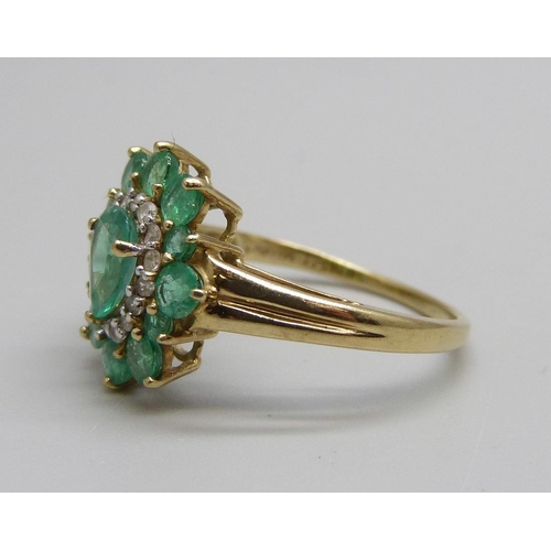 1072 - A 9ct gold, emerald and white sapphire ring, 2.7g, R