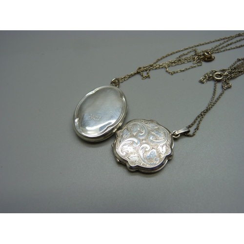 1075 - Two silver lockets and chains