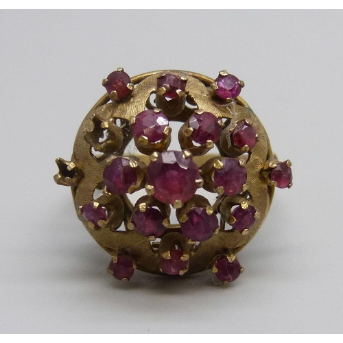 1088 - A 14ct gold and ruby cluster ring, two stones missing, 5.9g, M