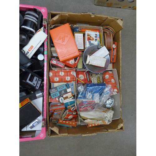 1120 - Three boxes of cameras and accessories, including flash guns, bulbs etc. **PLEASE NOTE THIS LOT IS N... 