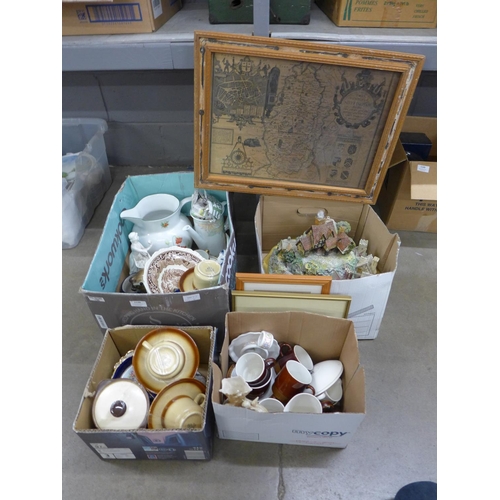 1148 - Four boxes of assorted items including china, figures and a large model village **PLEASE NOTE THIS L... 