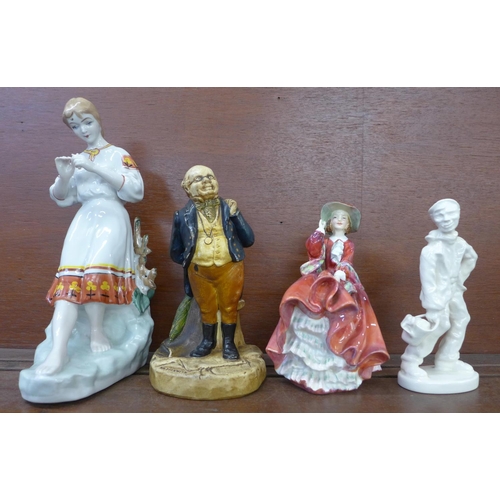 601 - A Bretby figure, Mr Pickwick, a 1930's Royal Doulton figure, Top o' the Hill, a Wedgwood & Co. cream... 