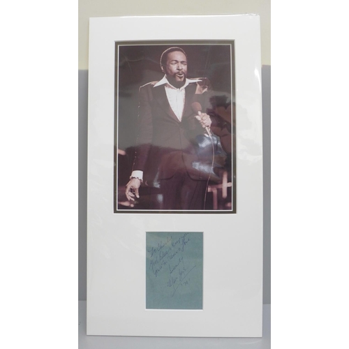 609 - A Marvin Gaye display, autographed note with dedication and photograph