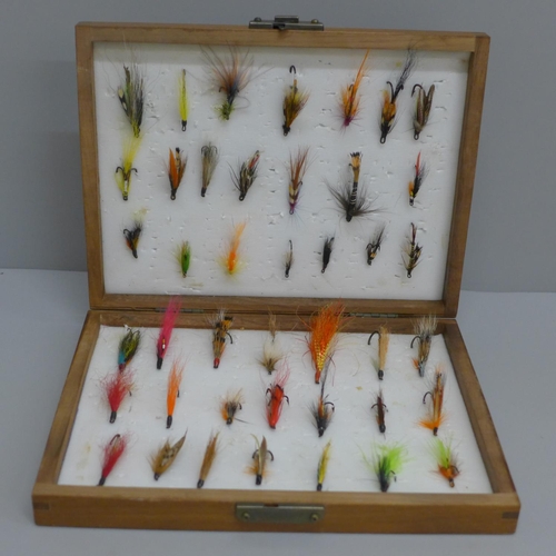 624 - A box of forty-two vintage salmon flies