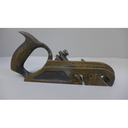 652 - A bronze woodworking plane