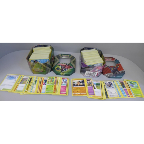 661 - 700 Assorted Pokemon cards including collector tins