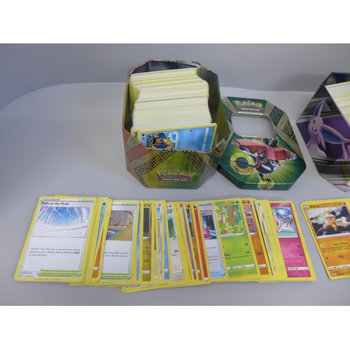 661 - 700 Assorted Pokemon cards including collector tins