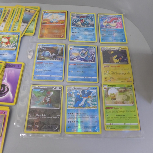 668 - 130 Holo/Rev Holo Pokemon cards in album and collectors tin and cards