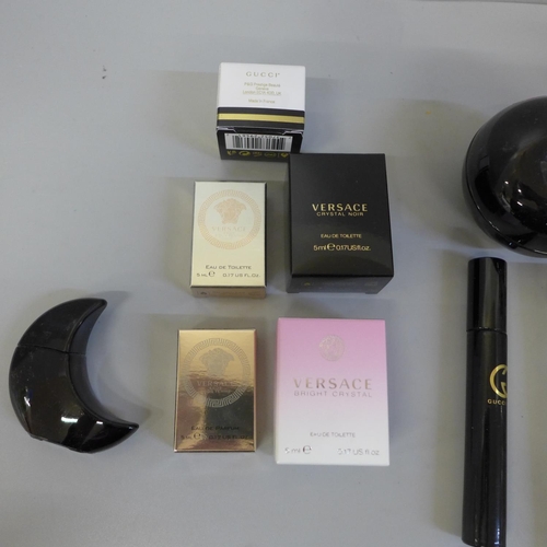 681 - Ten assorted perfumes including Yves St. Laurent, DKNY, Gucci Guilty, Versace, etc.