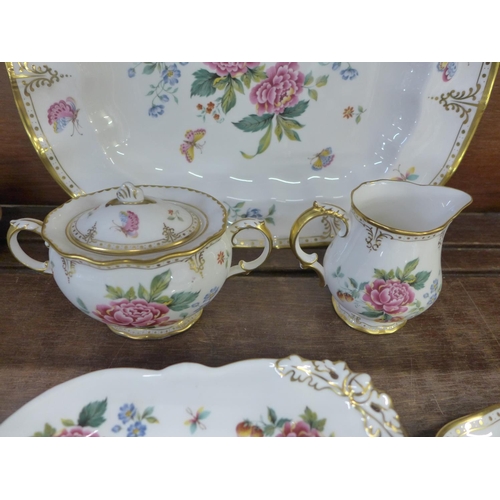 696 - A Royal Crown Derby Days serving plate, one other plate, sugar basin with lid, cream jug and tea pla... 