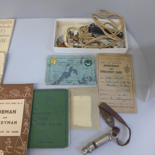 713 - A collection of Scout related ephemera, a pocket knife, whistle, badges, etc.