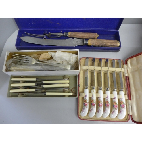 773 - A collection of flatware and utensils