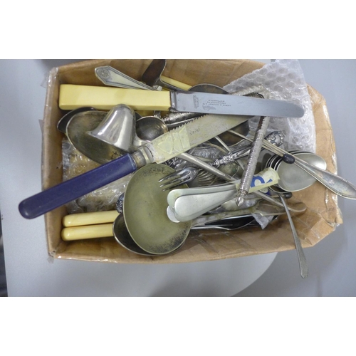 773 - A collection of flatware and utensils