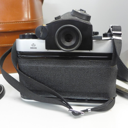 786 - A Kiev medium format camera, cased, with two filters, lens cap and shutter releases