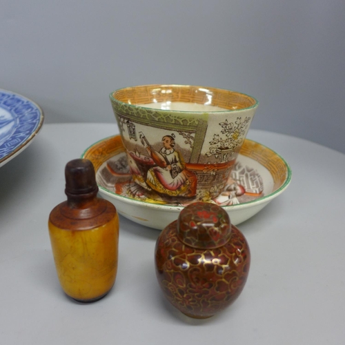 807 - A Japanese blue and white charger, 37cm, a/f, a Chinese style cup and saucer and two spice jars