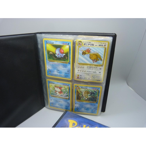 825 - Two Wizards of the Coast Pokemon original binders including first editions and holos cards