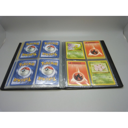 825 - Two Wizards of the Coast Pokemon original binders including first editions and holos cards