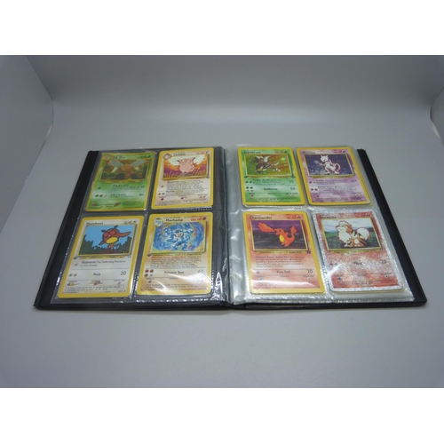 825 - Two Wizards of the Coast Pokemon original binders including first editions and holos cards