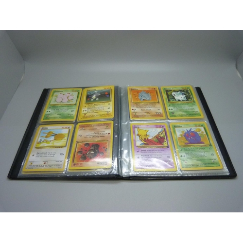 825 - Two Wizards of the Coast Pokemon original binders including first editions and holos cards