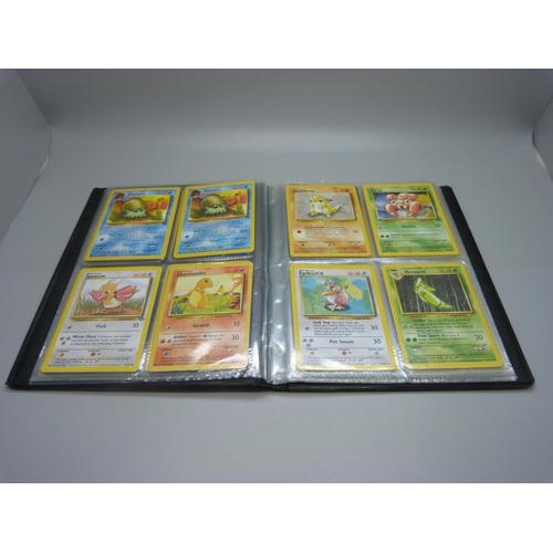 825 - Two Wizards of the Coast Pokemon original binders including first editions and holos cards