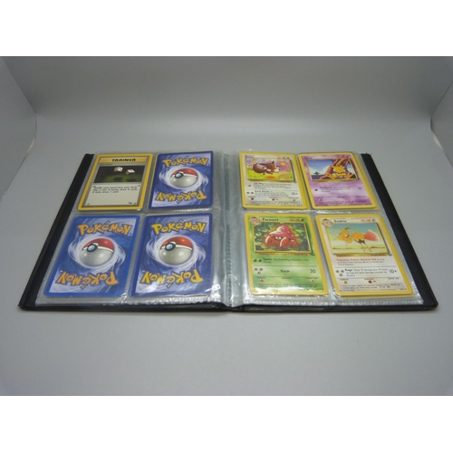 825 - Two Wizards of the Coast Pokemon original binders including first editions and holos cards