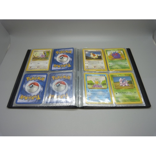 825 - Two Wizards of the Coast Pokemon original binders including first editions and holos cards