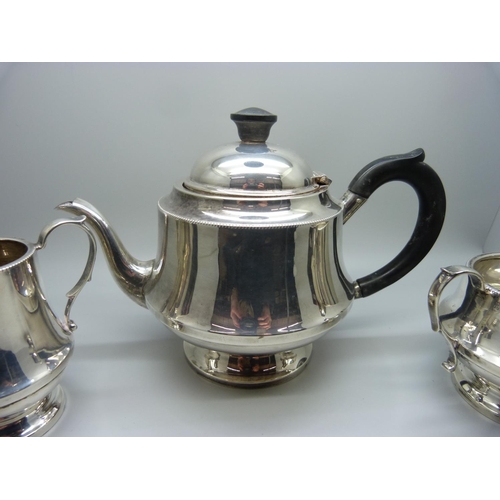 835 - A three piece silver tea service, Birmingham 1938,  by Dennison, 583g