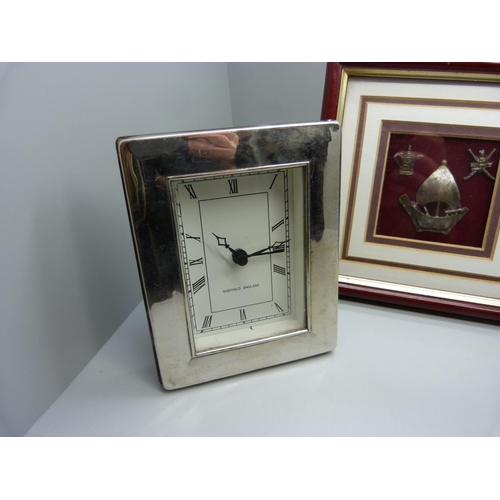 836 - A silver photograph frame, 20.5cm x 25.5cm, a silver framed clock and three small white metal easter... 