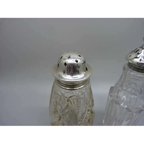 844 - Two silver topped glass shakers, one top a/f