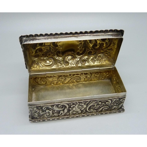 847 - A Victorian rectangular embossed silver box, 81g, 94mm wide, a/f