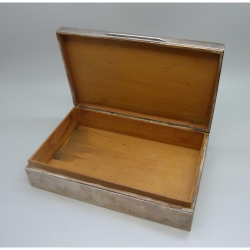 848 - A silver cigarette box with St. Annes Golf Club engraving to the lid, cedar lined, by Walker & Hall,... 