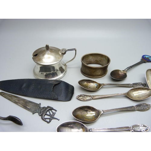 867 - A set of six silver spoons, five other silver spoons, a silver napkin ring, a silver mustard, a pair... 