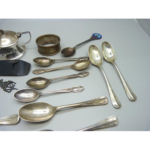 867 - A set of six silver spoons, five other silver spoons, a silver napkin ring, a silver mustard, a pair... 