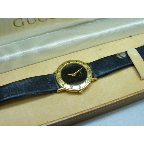 878 - A lady's Gucci wristwatch, 3001L model, with original box