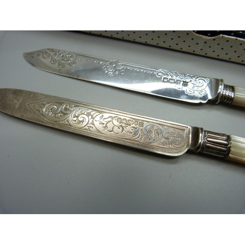 879 - Two silver and mother of pearl cake knives, Sheffield 1886 and 1921 and one other with silver handle... 