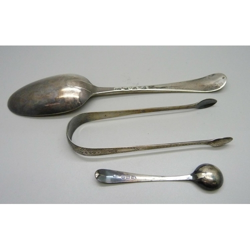 881 - A Georgian silver spoon, a pair of silver sugar bows and a Georgian silver mustard spoon, 98g