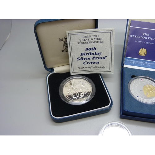 888 - A The Royal Mint 90th Birthday silver proof crown, a Waterloo Victory Medal crown and a Tercentenary... 