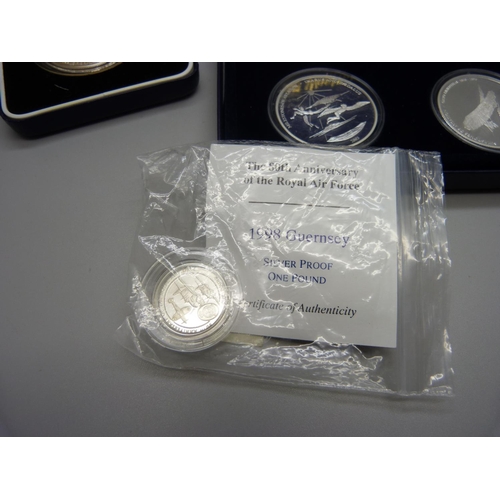 890 - An 80th Anniversary of the Royal Air Force 1998 silver proof £1 coin, a set of four Milestones of Av... 