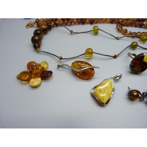 914 - A collection of amber jewellery including some silver mounted