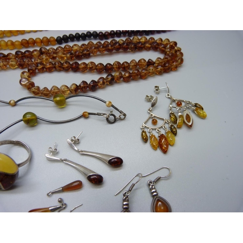 914 - A collection of amber jewellery including some silver mounted