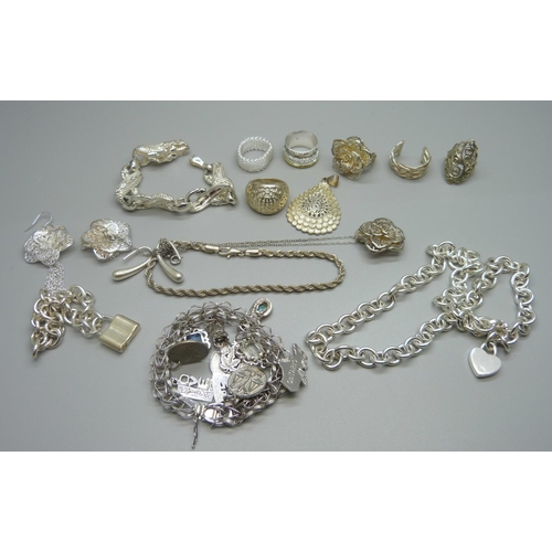 915 - A dragon bracelet and a neck chain, both marked 925, and other silver tone jewellery