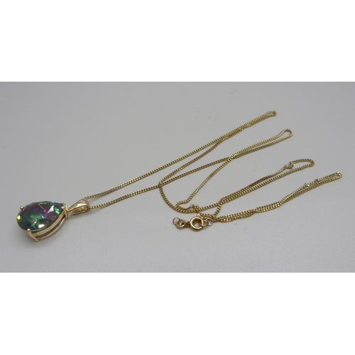 931 - A large 9ct gold, mystic topaz pendant and chain, 9.6g