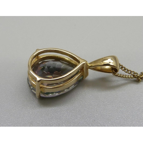 931 - A large 9ct gold, mystic topaz pendant and chain, 9.6g